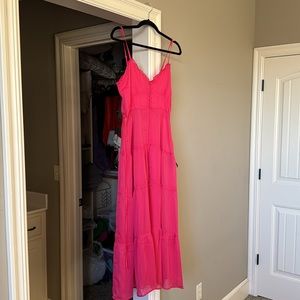 Dress from Lulu’s that opens up in the front and is see through. Wear with skirt